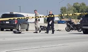 Police Car Speeds Through Intersection — Officers Rush Into Dark Alley as Crowd Watches